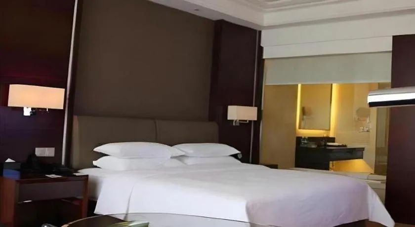 Bed in Venus Royal Hotel Shenzhen International Exhibition Center