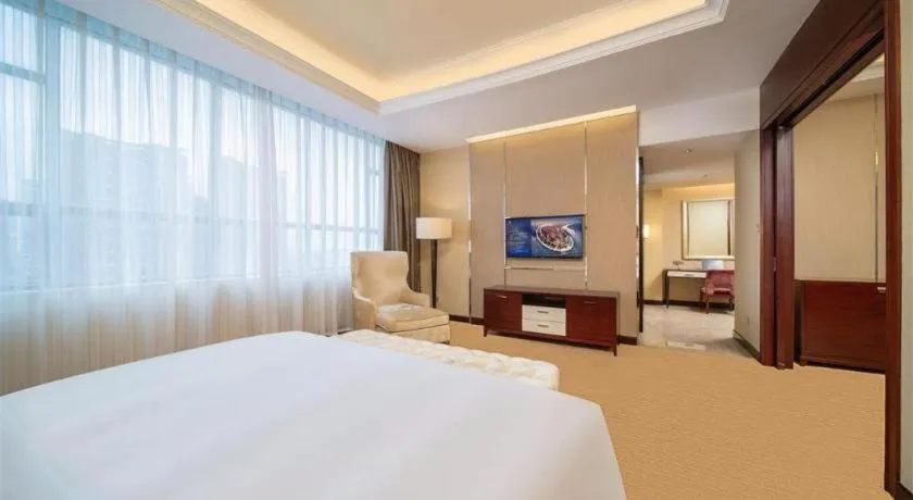 Bed in Venus Royal Hotel Shenzhen International Exhibition Center