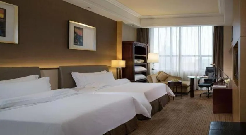 Bed in Venus Royal Hotel Shenzhen International Exhibition Center