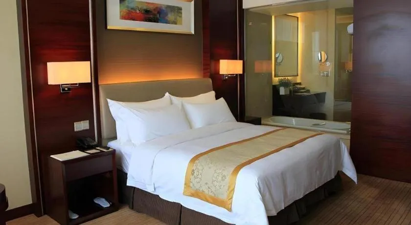 Bed in Venus Royal Hotel Shenzhen International Exhibition Center