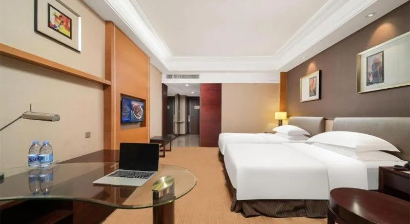 Bed in Venus Royal Hotel Shenzhen International Exhibition Center