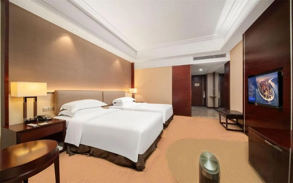 Bed in Venus Royal Hotel Shenzhen International Exhibition Center