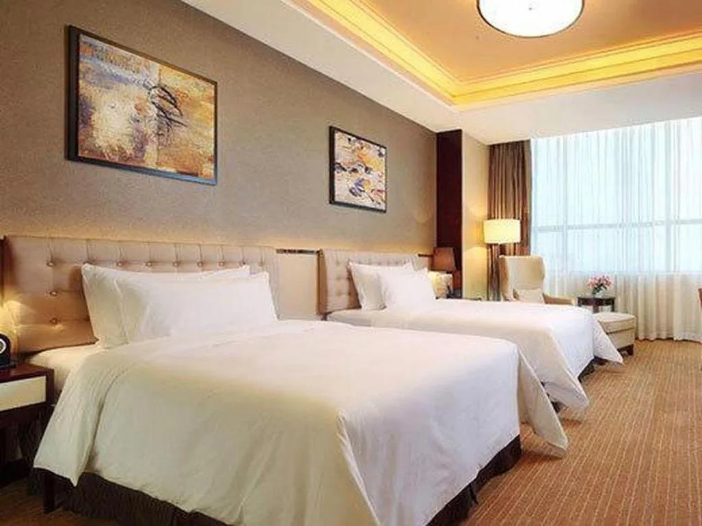 Bed in Venus Royal Hotel Shenzhen International Exhibition Center