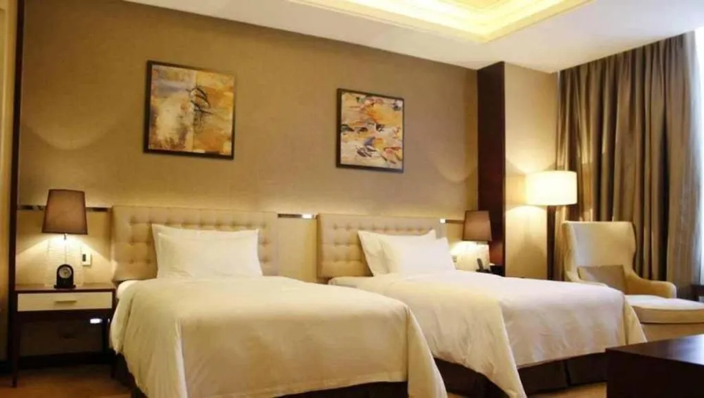 Bed in Venus Royal Hotel Shenzhen International Exhibition Center