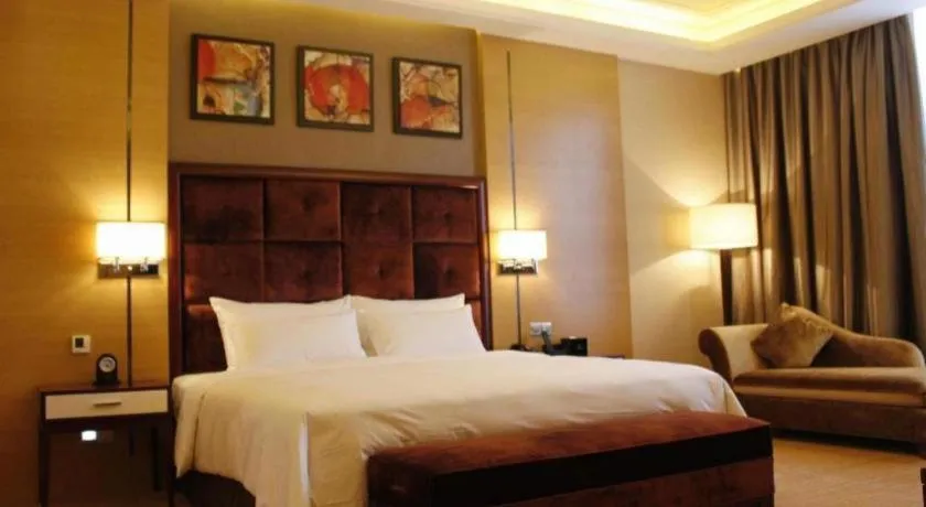 Bed in Venus Royal Hotel Shenzhen International Exhibition Center