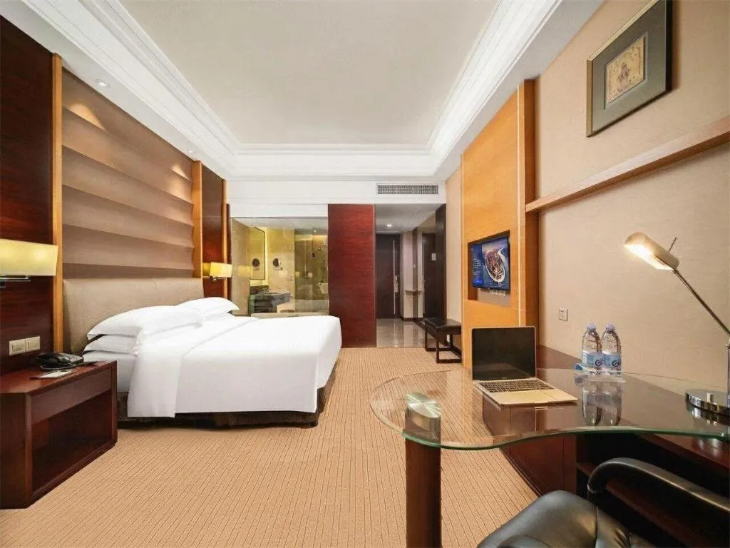 Bed in Venus Royal Hotel Shenzhen International Exhibition Center