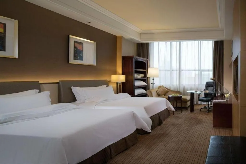 Bed in Venus Royal Hotel Shenzhen International Exhibition Center