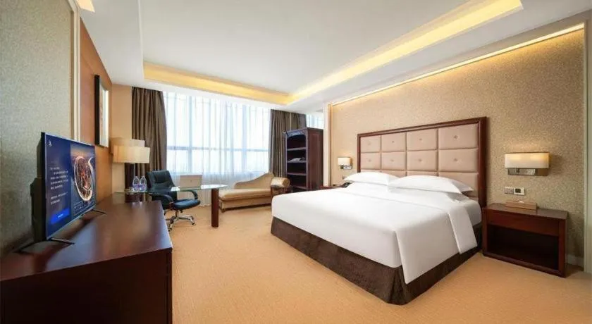 Bed in Venus Royal Hotel Shenzhen International Exhibition Center