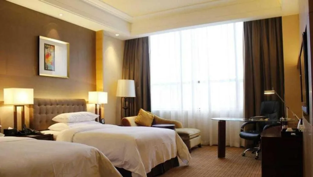 Bed in Venus Royal Hotel Shenzhen International Exhibition Center