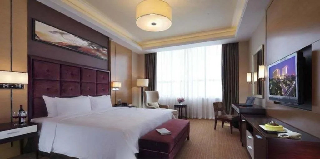 Bed in Venus Royal Hotel Shenzhen International Exhibition Center