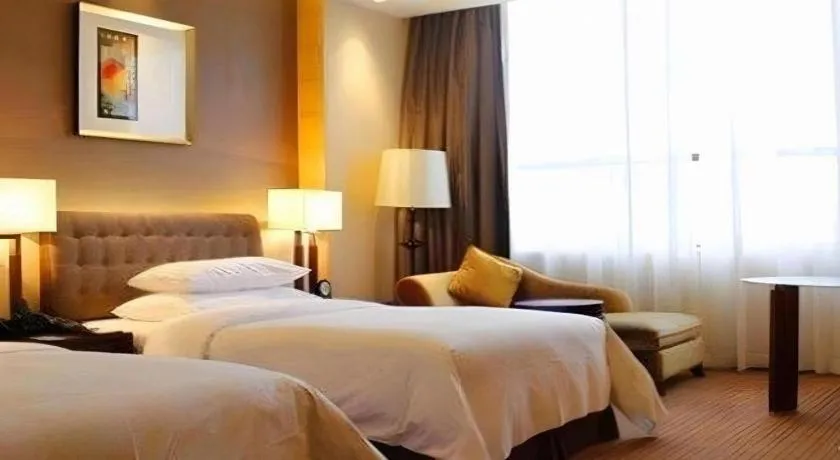 Bed in Venus Royal Hotel Shenzhen International Exhibition Center