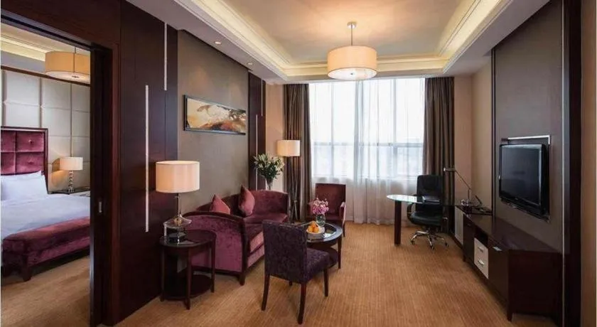 Bed in Venus Royal Hotel Shenzhen International Exhibition Center