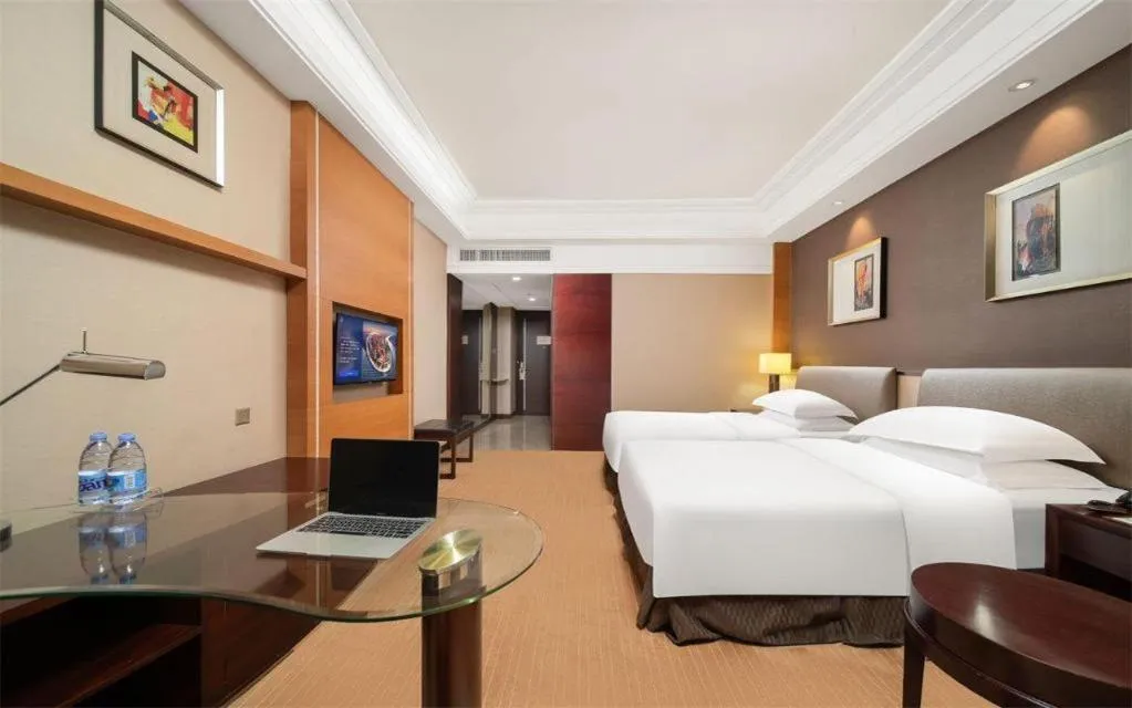 Bed in Venus Royal Hotel Shenzhen International Exhibition Center