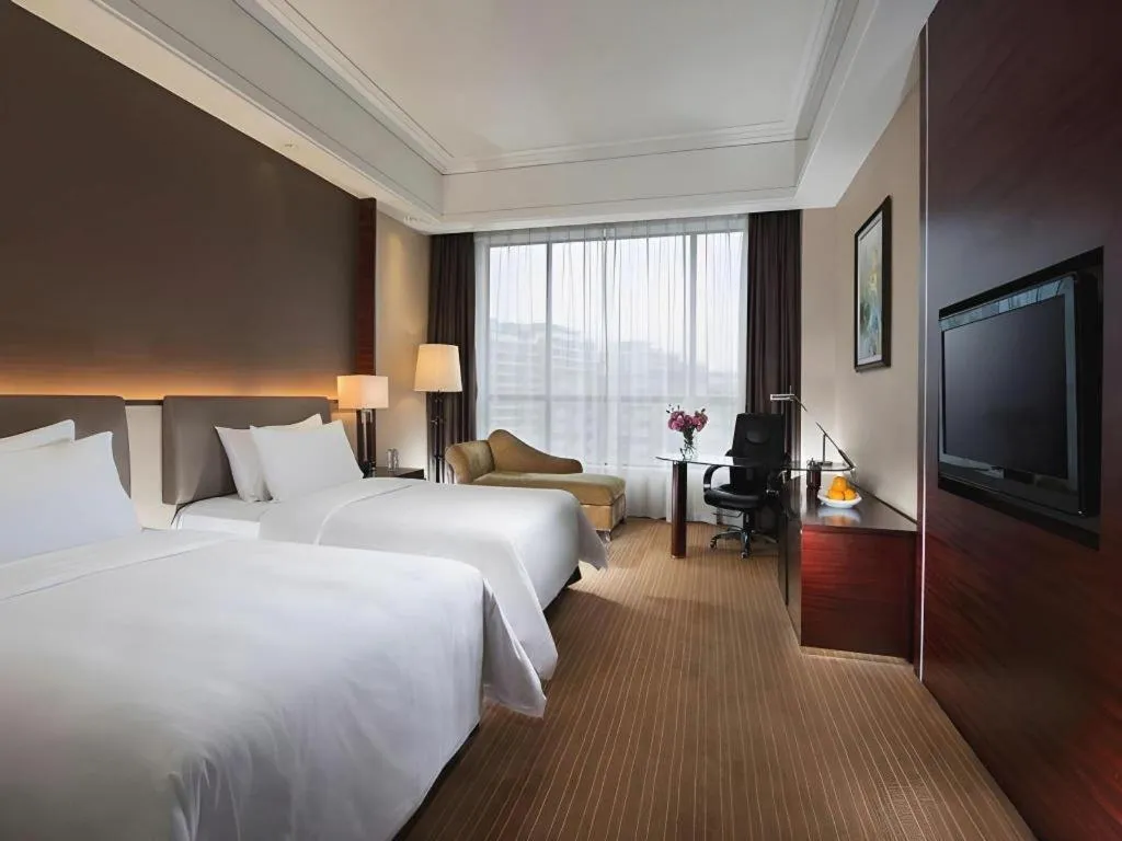 Bed in Venus Royal Hotel Shenzhen International Exhibition Center