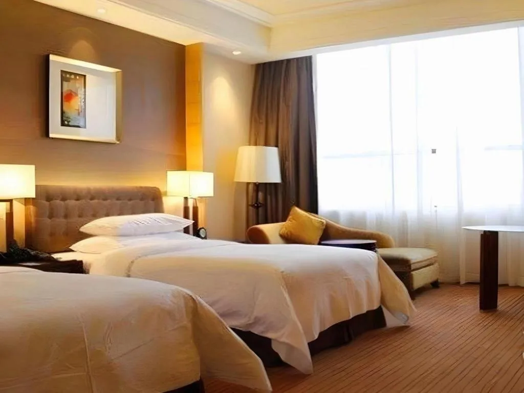 Bed in Venus Royal Hotel Shenzhen International Exhibition Center