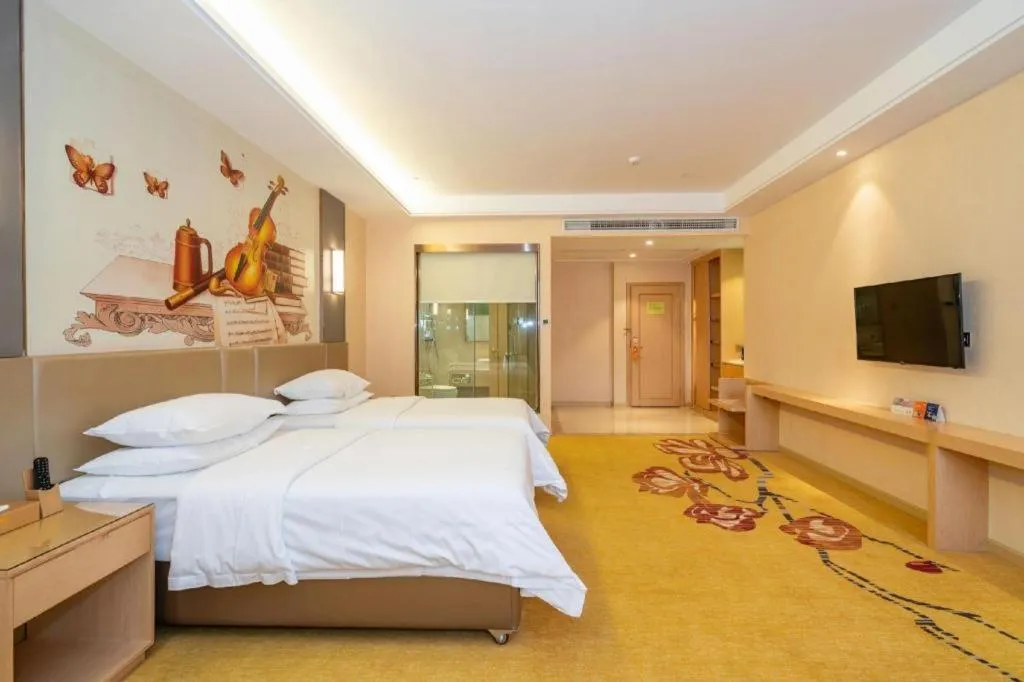 Bed in Vienna Hotel Fuzhou Changle Zhenghe Metro Station