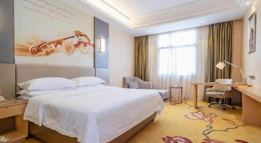 Bed in Vienna Hotel Fuzhou Changle Zhenghe Metro Station