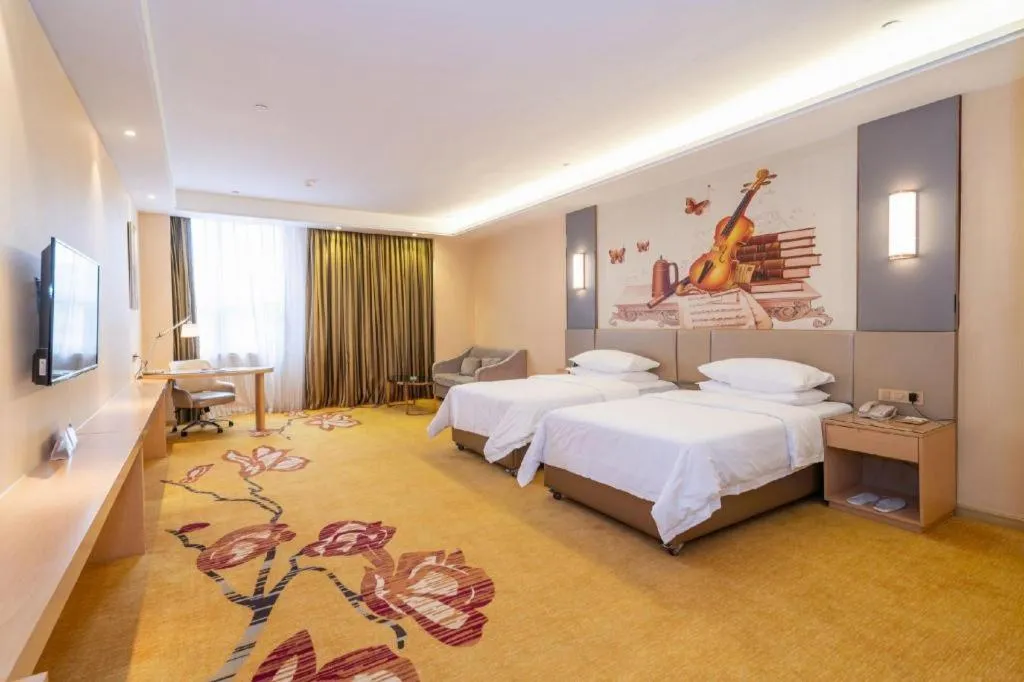 Bed in Vienna Hotel Fuzhou Changle Zhenghe Metro Station