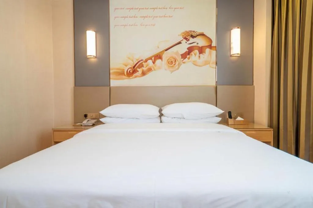 Bed in Vienna Hotel Fuzhou Changle Zhenghe Metro Station