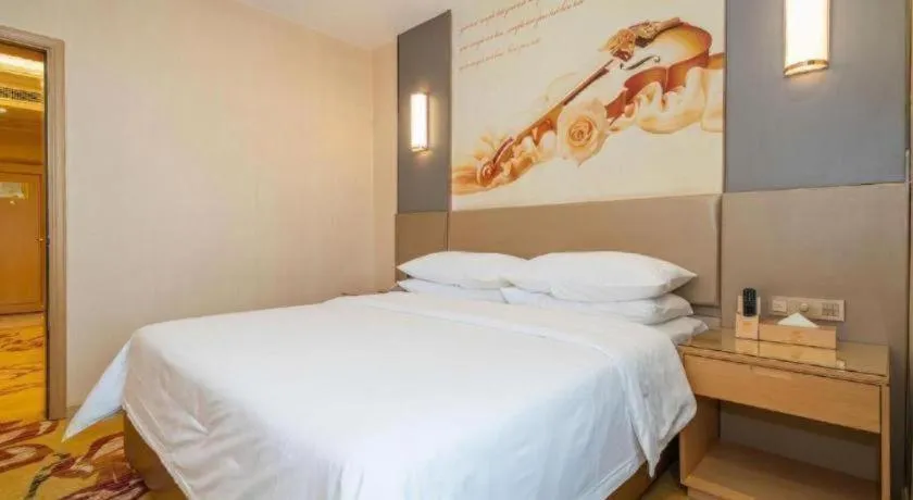 Bed in Vienna Hotel Fuzhou Changle Zhenghe Metro Station