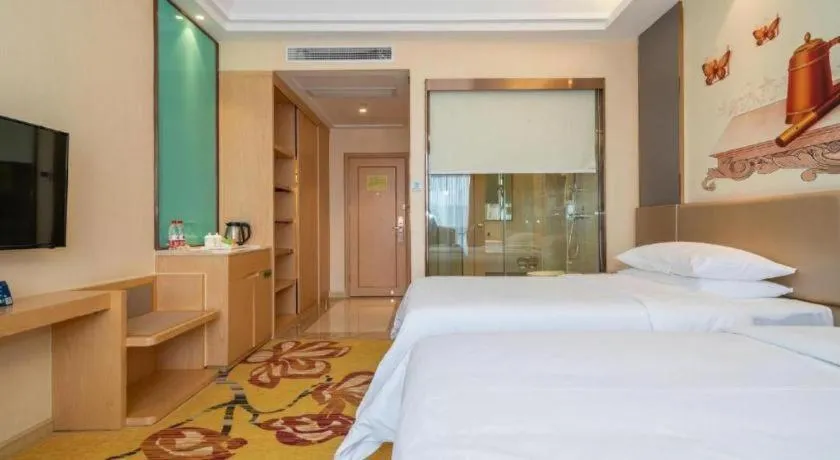 Bed in Vienna Hotel Fuzhou Changle Zhenghe Metro Station