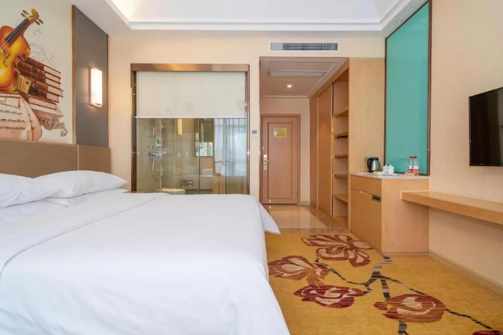 Bed in Vienna Hotel Fuzhou Changle Zhenghe Metro Station