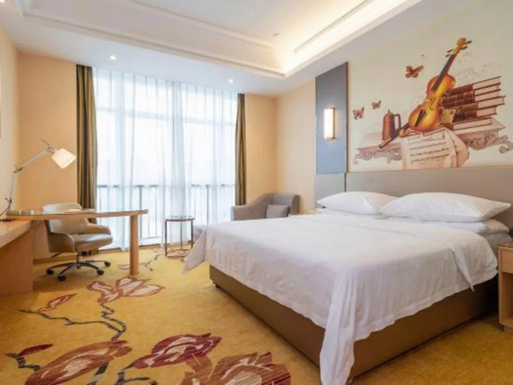 Bed in Vienna Hotel Fuzhou Changle Zhenghe Metro Station