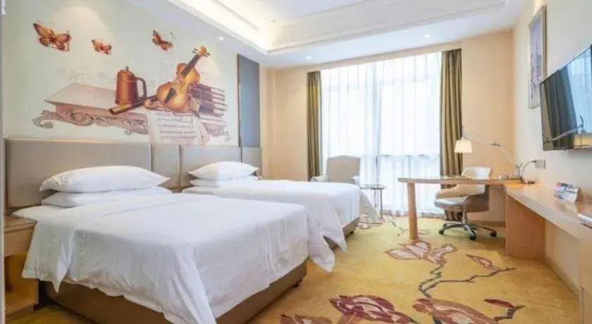 Bed in Vienna Hotel Fuzhou Changle Zhenghe Metro Station Bed in Vienna Hotel Fuzhou Changle Zhenghe Metro Station