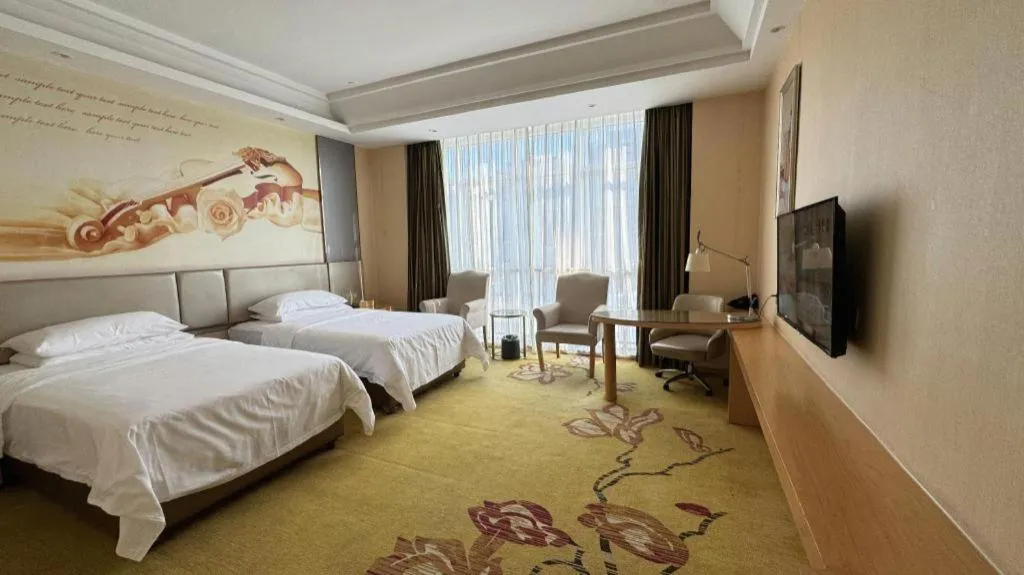 Bed in Vienna Hotel Fuzhou Changle Zhenghe Metro Station