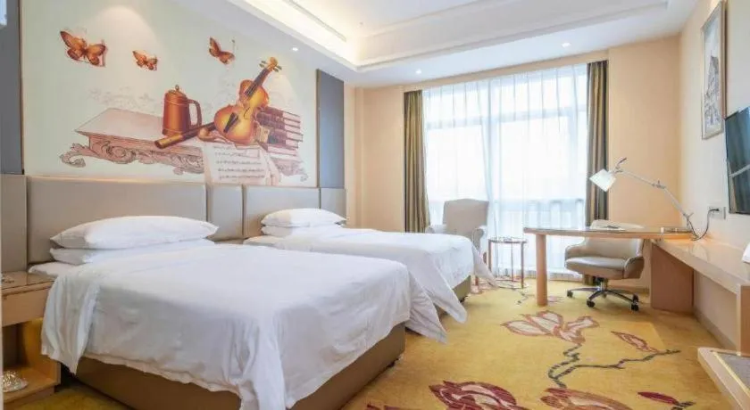 Bed in Vienna Hotel Fuzhou Changle Zhenghe Metro Station