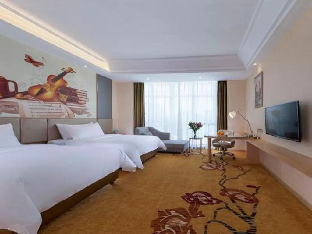 Bed in Vienna Hotel Fuzhou Changle Zhenghe Metro Station