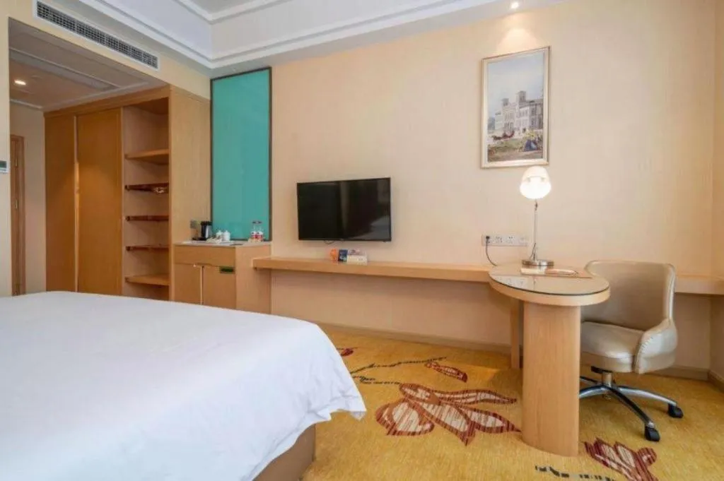 Bed in Vienna Hotel Fuzhou Changle Zhenghe Metro Station