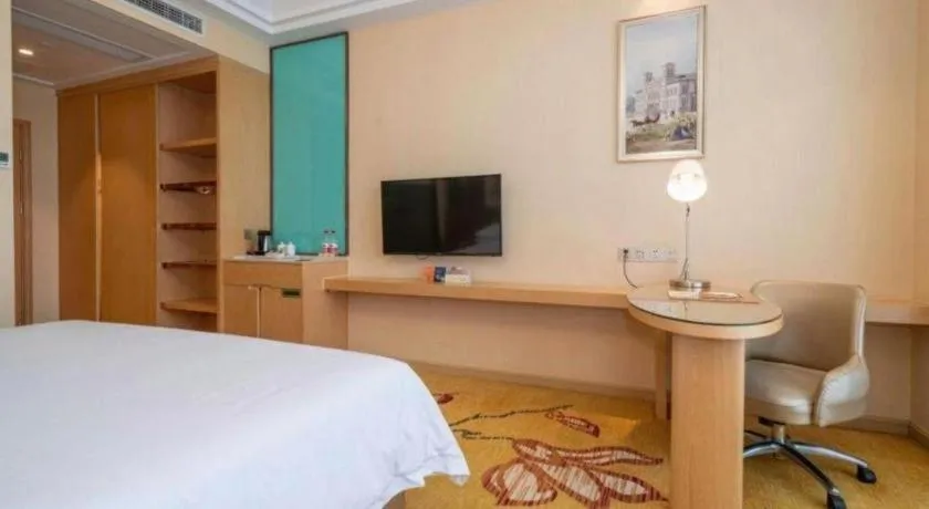 Bed in Vienna Hotel Fuzhou Changle Zhenghe Metro Station