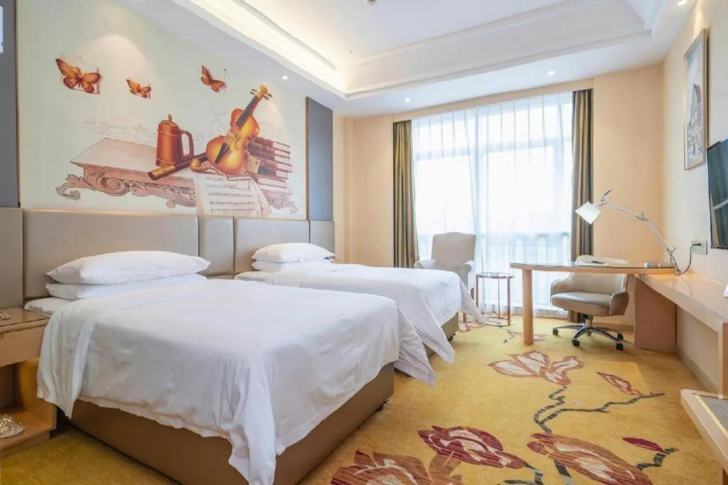 Bed in Vienna Hotel Fuzhou Changle Zhenghe Metro Station