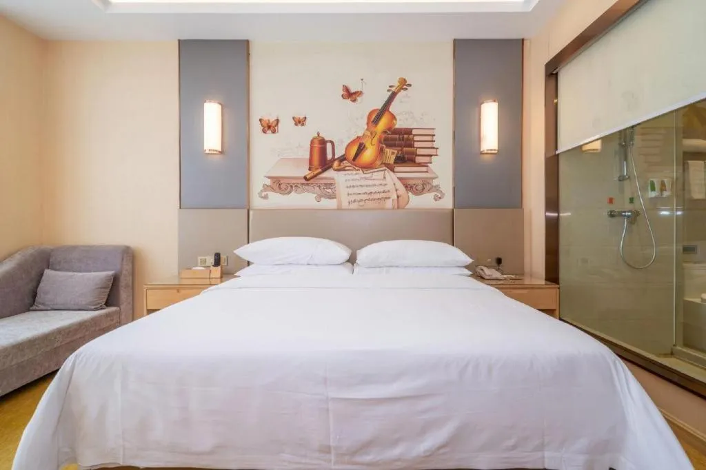 Bed in Vienna Hotel Fuzhou Changle Zhenghe Metro Station