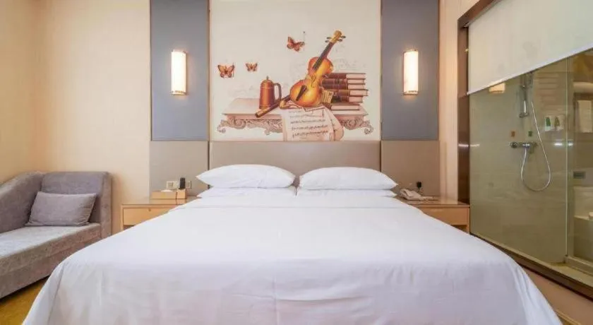 Bed in Vienna Hotel Fuzhou Changle Zhenghe Metro Station