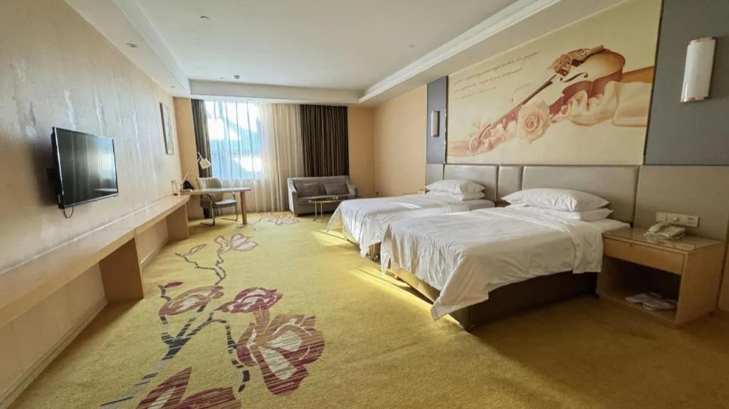 Bed in Vienna Hotel Fuzhou Changle Zhenghe Metro Station