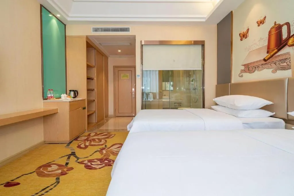 Bed in Vienna Hotel Fuzhou Changle Zhenghe Metro Station