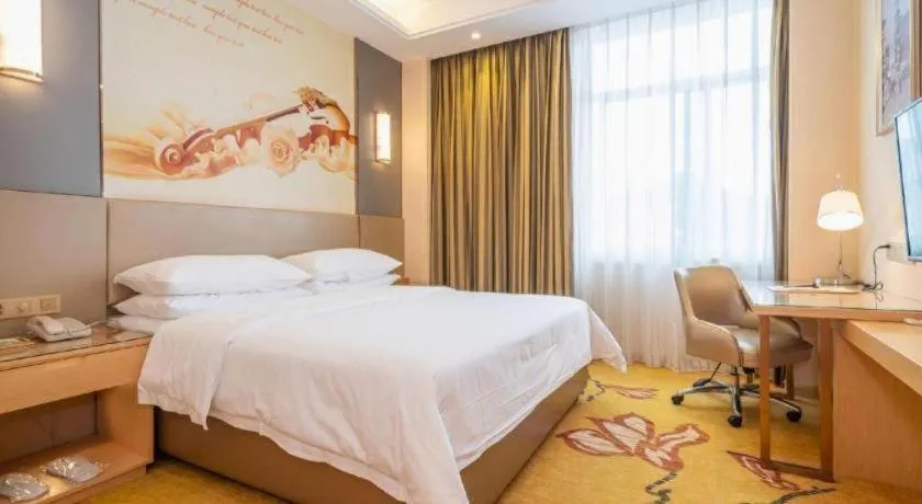 Bed in Vienna Hotel Fuzhou Changle Zhenghe Metro Station