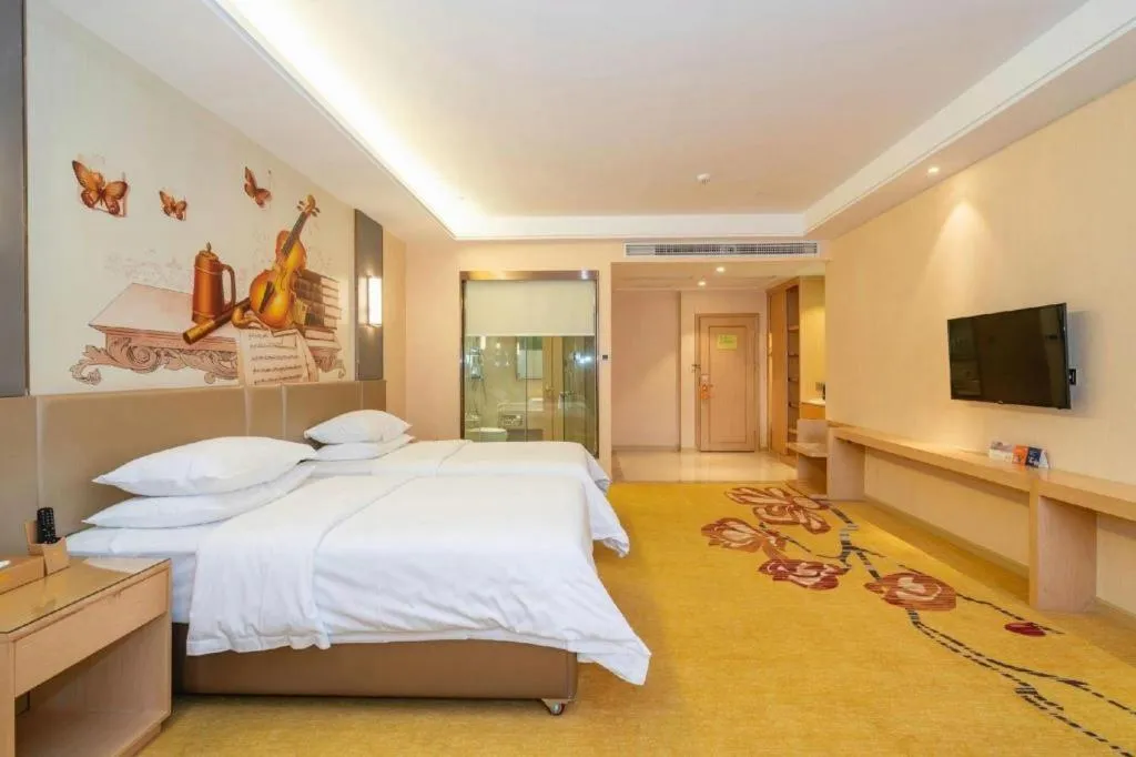 Bed in Vienna Hotel Fuzhou Changle Zhenghe Metro Station