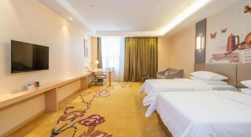 Bed in Vienna Hotel Fuzhou Changle Zhenghe Metro Station