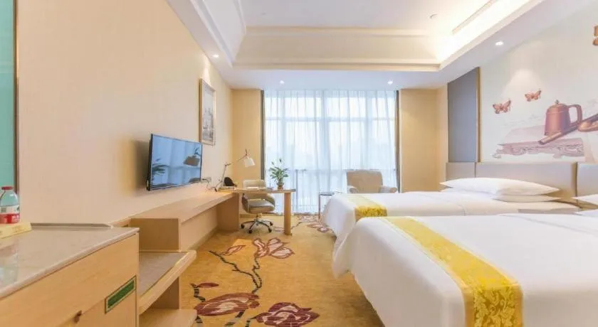 Bed in Vienna Hotel Fuzhou Changle Zhenghe Metro Station