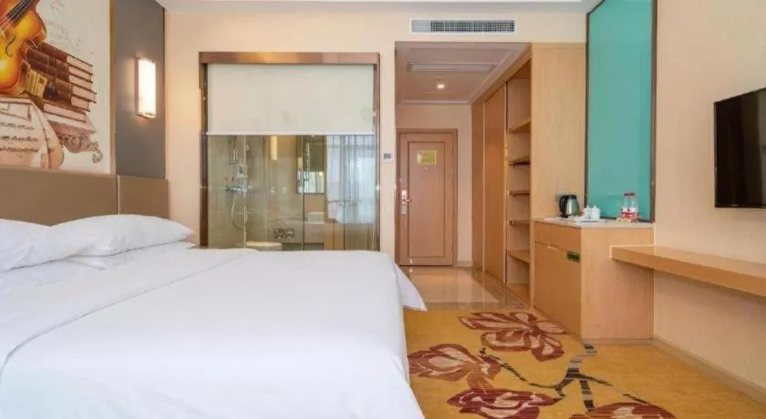 Bed in Vienna Hotel Fuzhou Changle Zhenghe Metro Station