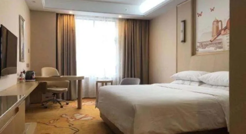 Bed in Vienna Hotel Zhejiang Tongxiang Puyuan