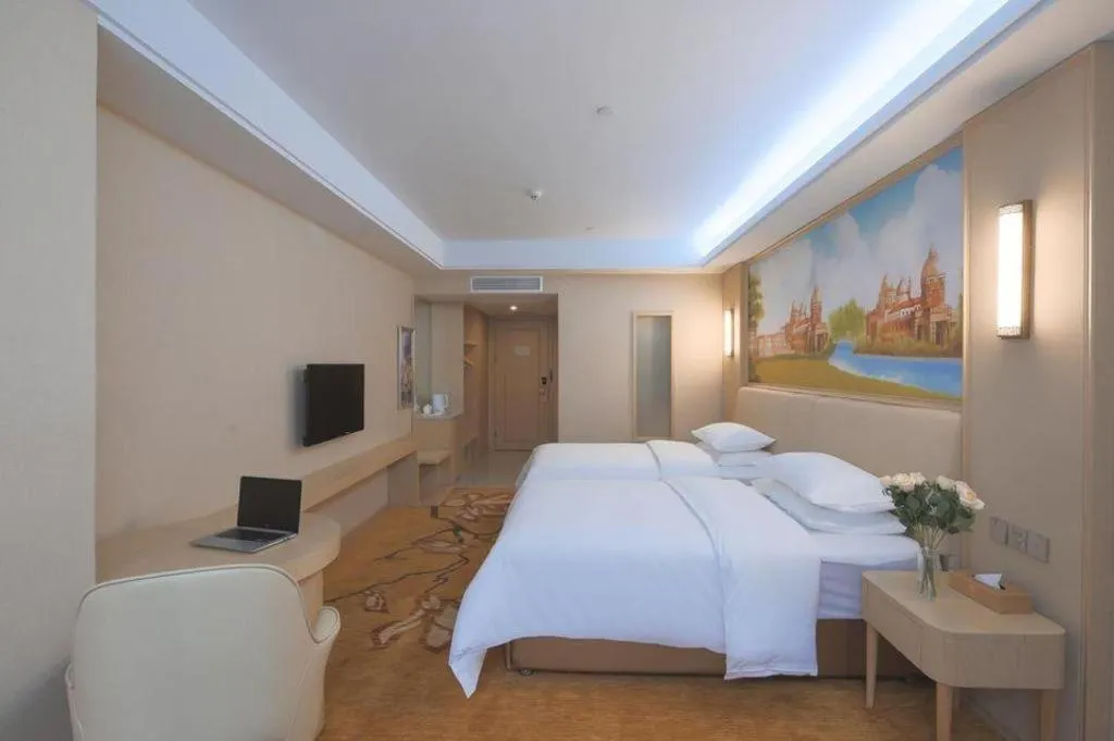 Bed in Vienna Hotel Zhejiang Tongxiang Puyuan