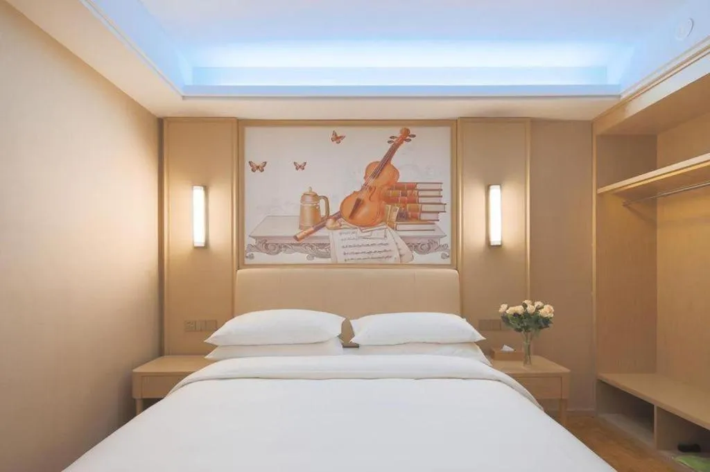 Bed in Vienna Hotel Zhejiang Tongxiang Puyuan