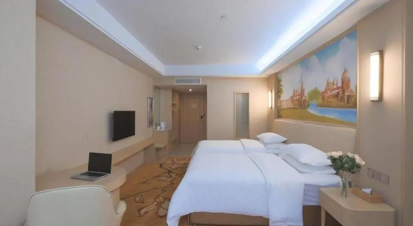 Bed in Vienna Hotel Zhejiang Tongxiang Puyuan