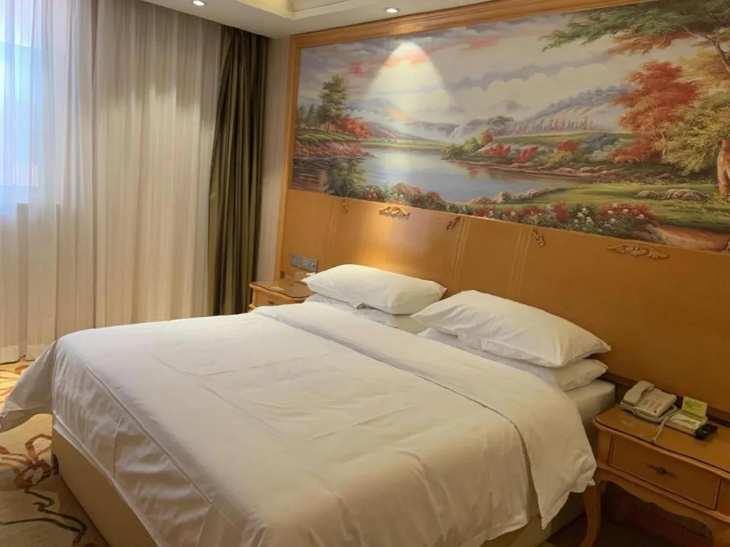 Bed in Vienna Hotel Qinghai Xining Wanda Plaza