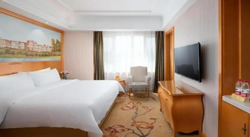 Bed in Vienna Hotel Qinghai Xining Wanda Plaza