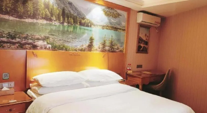 Bed in Vienna Hotel Qinghai Xining Wanda Plaza
